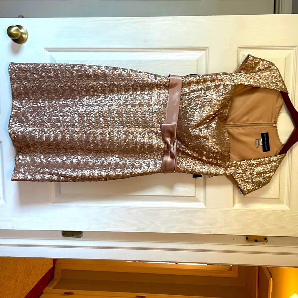 Size 10 classic rose gold sequin dress with adorable bow to show off your waist